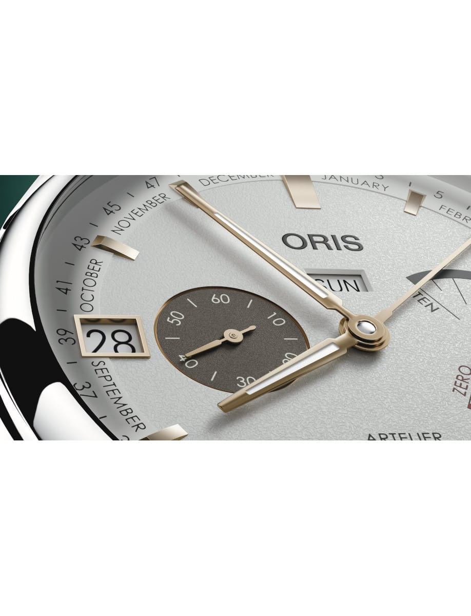 Close view of Oris Artelier Calibre 113 wristwatch with stainless steel case, white dial, and dark brown cordovan strap.