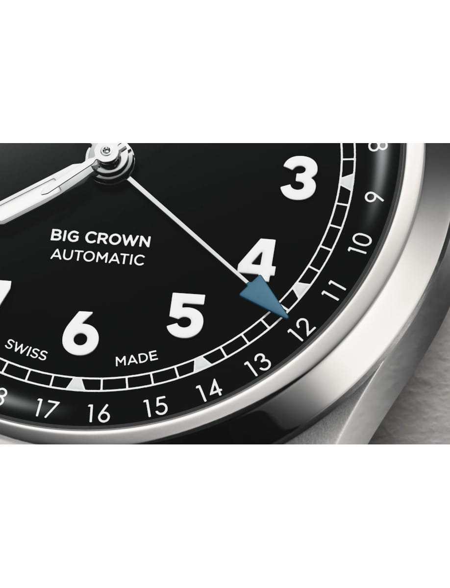 Close view of Oris Big Crown Pointer Date wristwatch with stainless steel case and bracelet, and black dial.