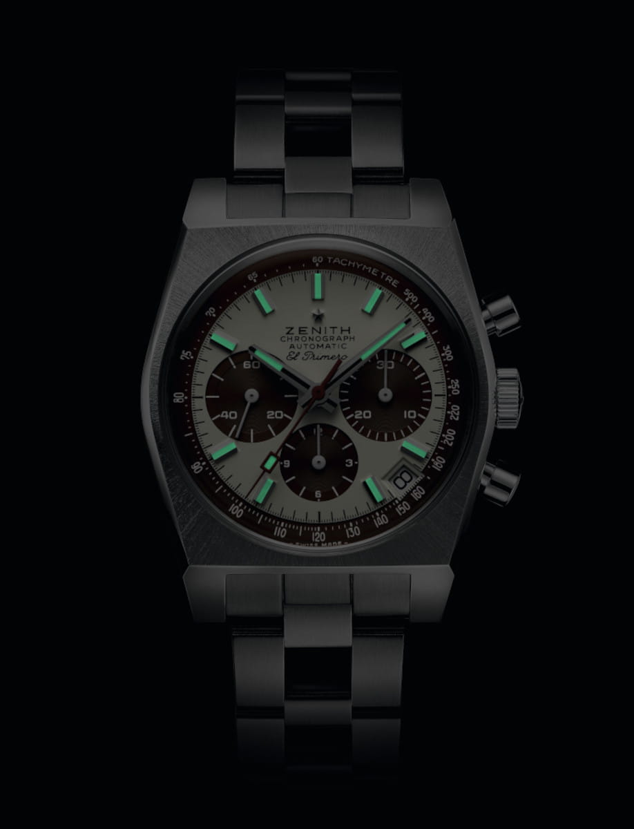 Night view of Zenith CHRONOMASTER Revival A384 wristwatch with stainless steel case and bracelet, and 