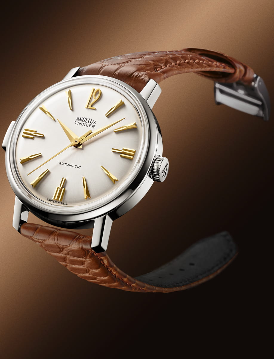 Side view of Angelus Tinkler wristwatch with stainless steel case, white dial, and saddle brown alligator flank leather.