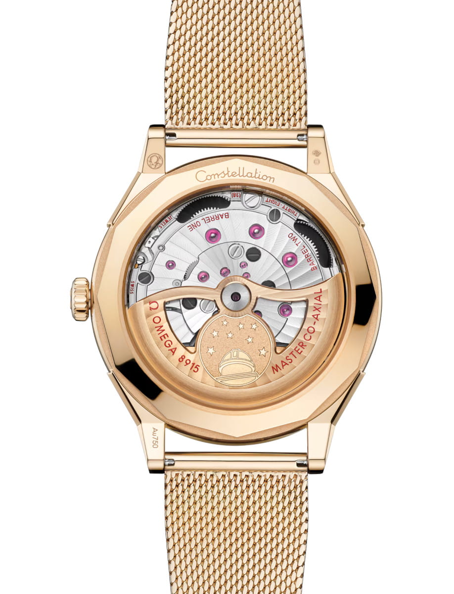 Back view of Constellation Observatory wristwatch with Moonshine™ gold case, dial and bracelet, and open case back.