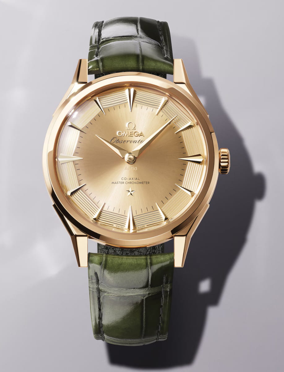 Front view of Constellation Observatory wristwatch with Moonshine™ gold case and dial, green Alligator leather.