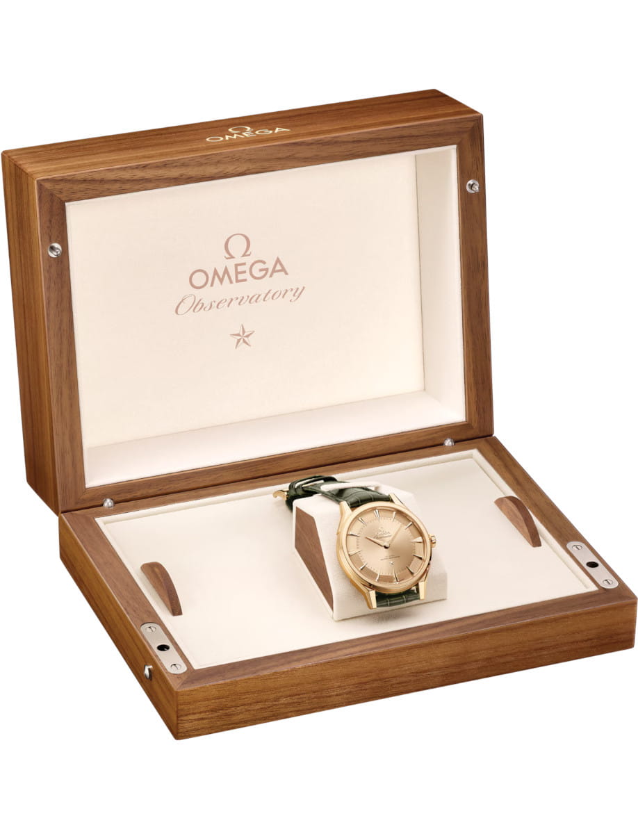 Box view of Constellation Observatory wristwatch with Moonshine™ gold case and dial, green Alligator leather.