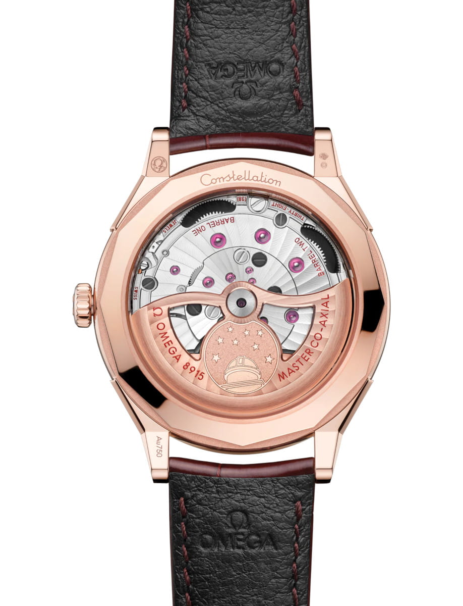Back view of Constellation Observatory wristwatch with Sedna™ gold case and dial, Burgundy alligator leather strap, and transparent case back.