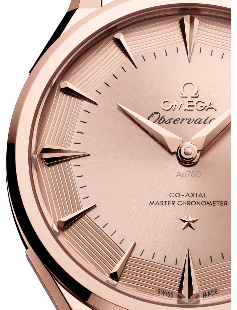 Close view of Constellation Observatory wristwatch with Sedna™ gold case and dial, and Burgundy alligator leather strap.