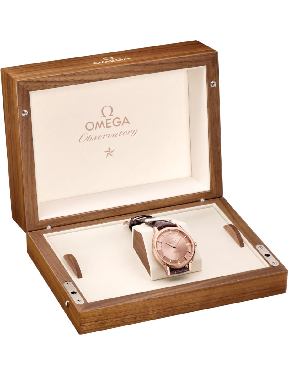Box view of Constellation Observatory wristwatch with Sedna™ gold case and dial, and Burgundy alligator leather strap.