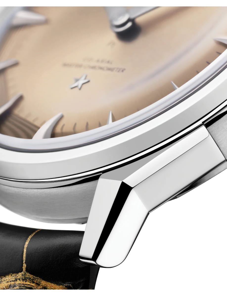 Side view of Constellation Observatory wristwatch with Platinum‑gold case, yellow dial, and black alligator leather strap.