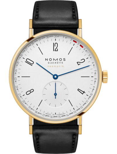 Nomos Tangente gold neomatik 38 Update wristwatch with 18k gold case, white silver-plated dial, and black Horween Genuine Shell Cordovan strap.