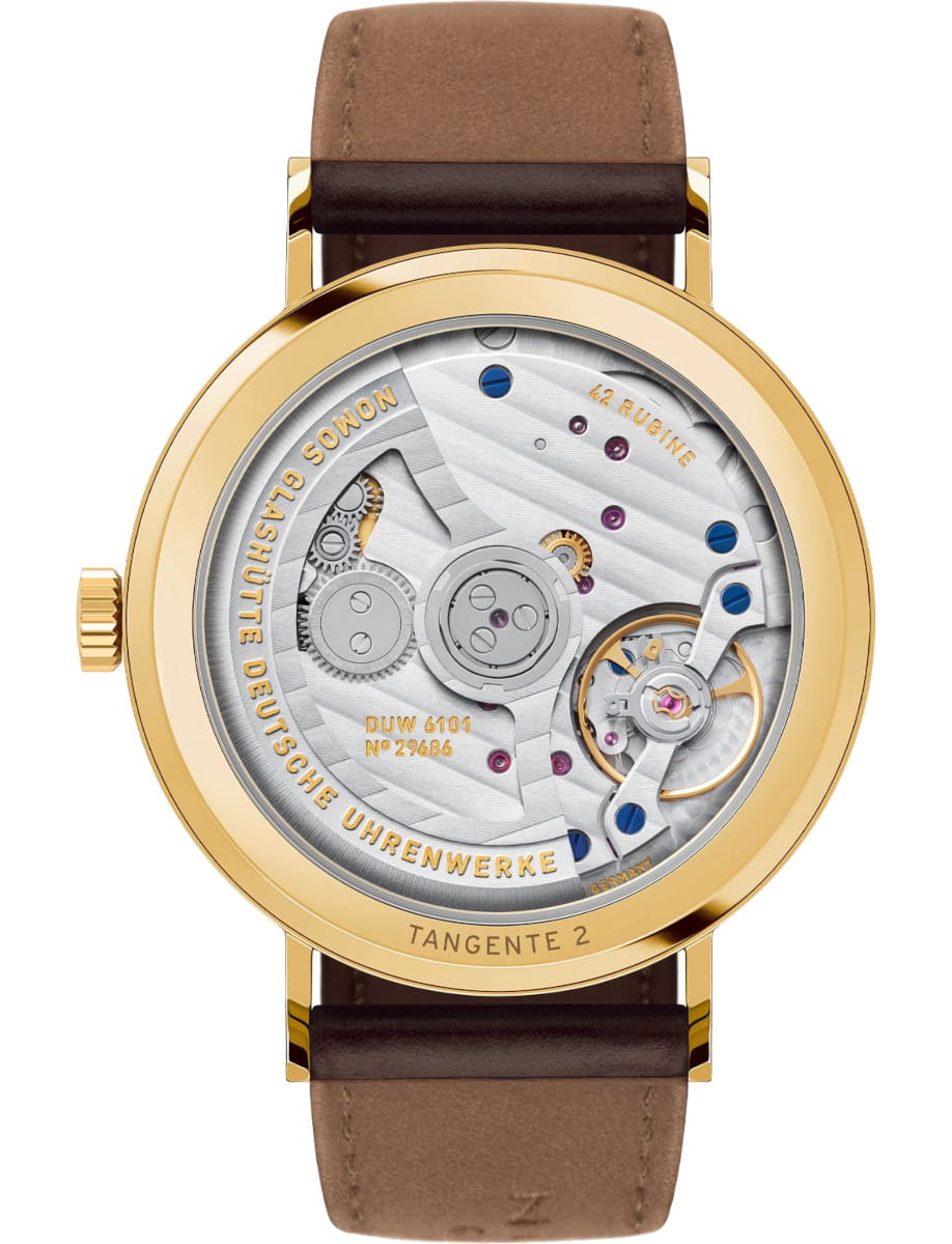 Back view of Nomos Tangente gold neomatik 38 Update Doré wristwatch with 18k gold case, open case back, and Horween Genuine Shell Cordovan remborde black strap.