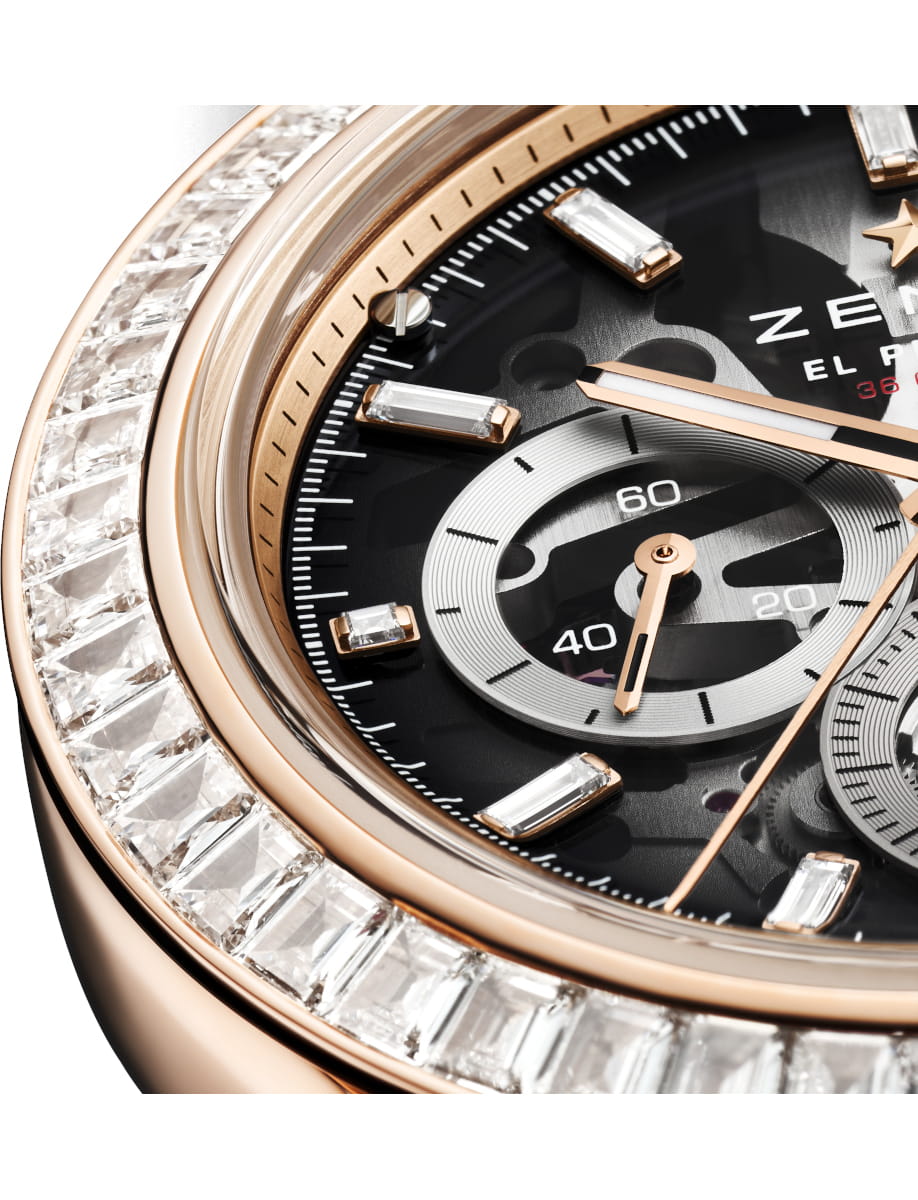 Bezel view of Zenith Chronomaster Sport Skeleton wristwatch with 18k rose gold case with 52 VVS baguette-cut diamonds bezel, openworked dial with tinted sapphire with three different-coloured counters, and 18k rose gold bracelet.