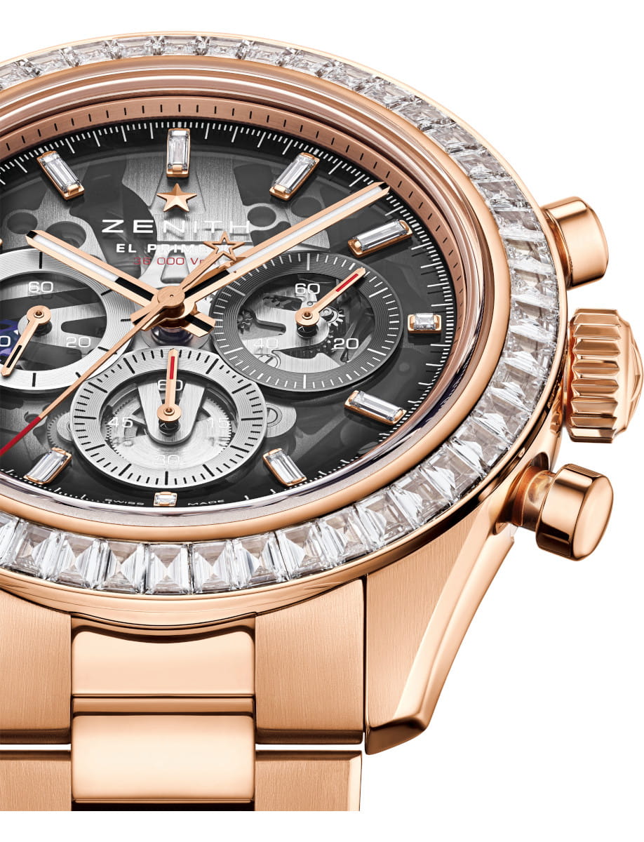 Close view of Zenith Chronomaster Sport Skeleton wristwatch with 18k rose gold case with 52 VVS baguette-cut diamonds bezel, openworked dial with tinted sapphire with three different-coloured counters, and 18k rose gold bracelet.