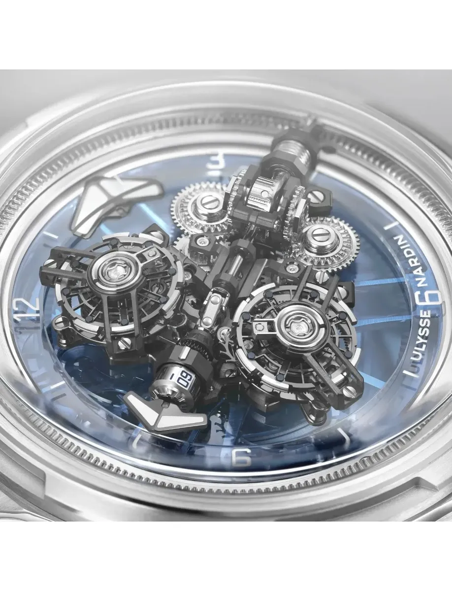 Close view of Ulysse Nardin Super Freak wristwatch with 18k white gold case, and grey rubber strap.