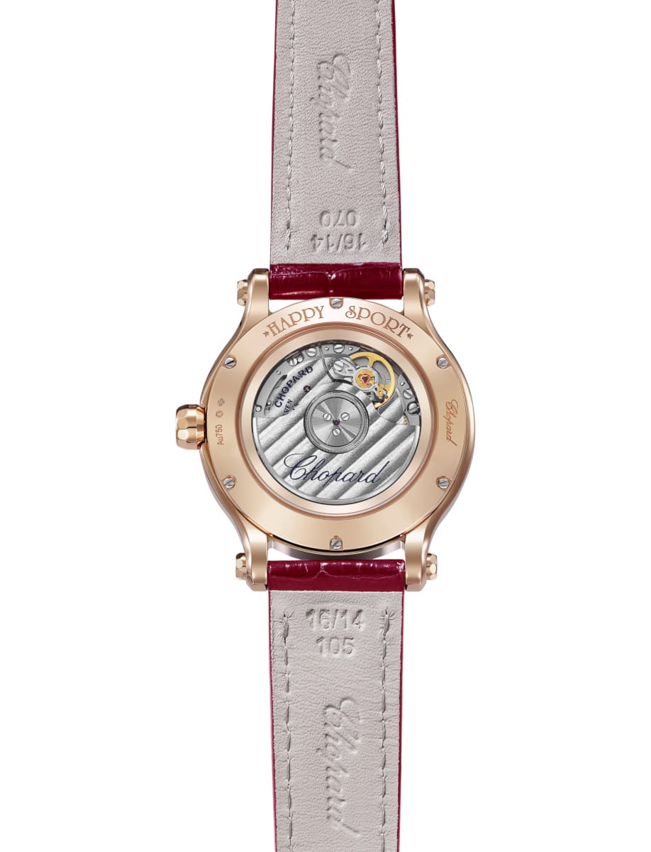Back view of Chopard wristwatch with 18K ethical rose gold case, silver dial and alligator leather strap