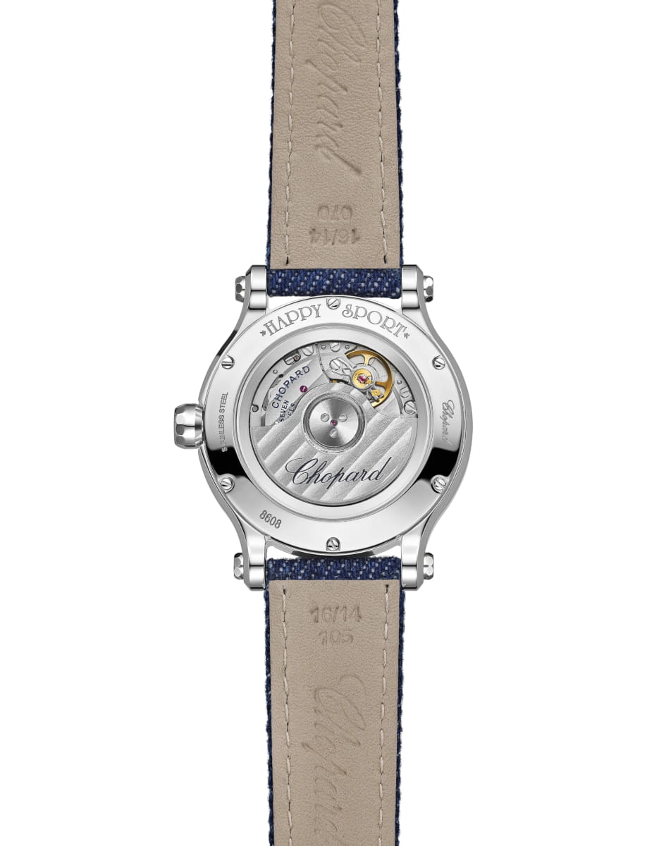 Back view of Chopard wristwatch with stainless steel case, mother of pearl dial and navy blue denim strap