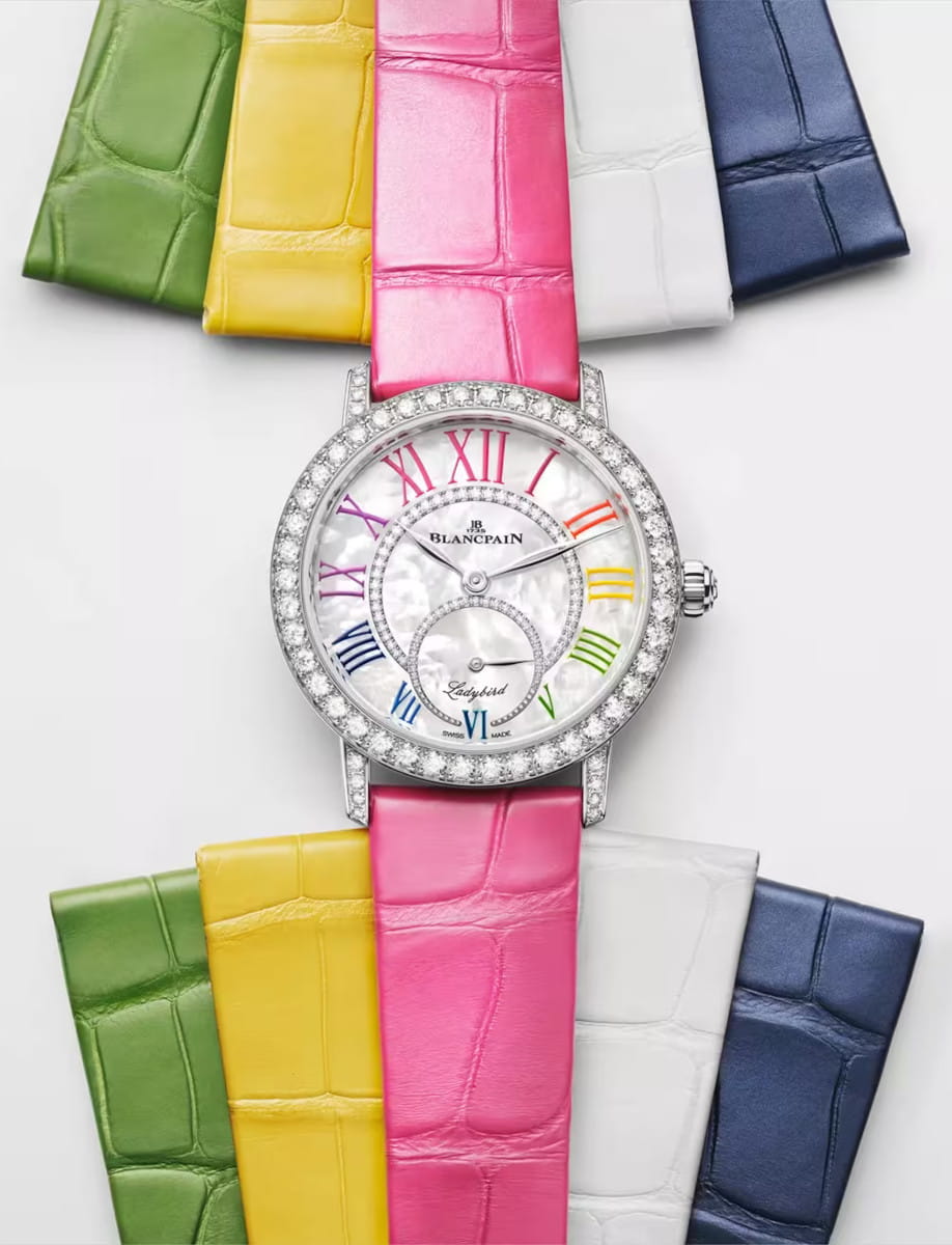 5 different straps of Blancpain Ladybird Colors wristwatch with white gold case, Mother-of-pearl set with diamonds, white Mother-of-pearl set with diamonds dial, and pink leather strap.