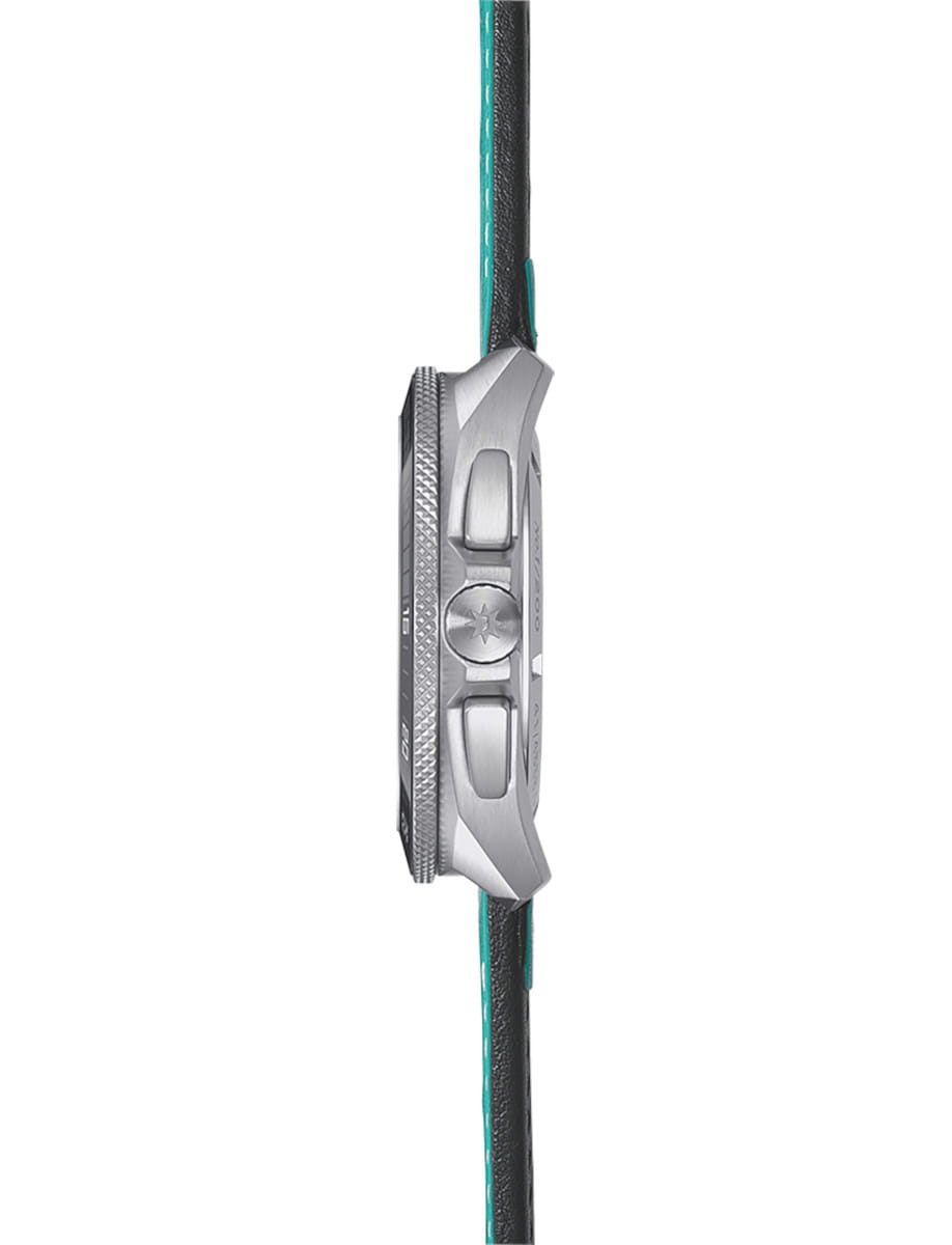 Side view of Junghans 1972 Chronoscope Sports Edition 2026 wristwatch with stainless steel case, matt turquoise dial with black vertical double stripe, and turquoise leather strap.
