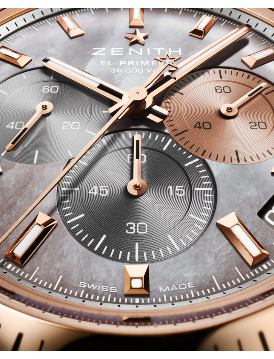 Close view of Zenith Chronomaster Sport wristwatch with stainless steel and 18k rose gold case and bracelet, mother-of-pearl dial with three different-coloured counters.