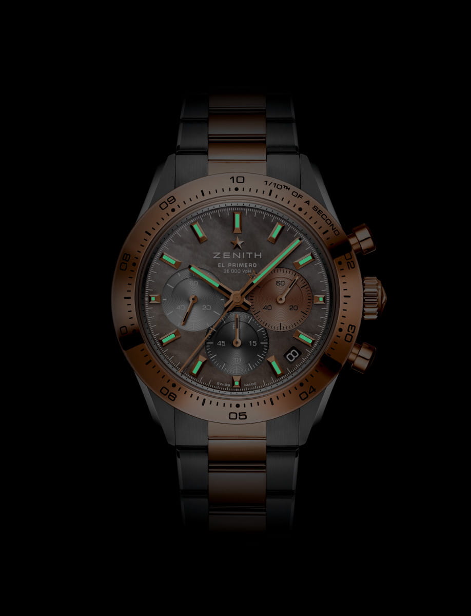 Dark view of Zenith Chronomaster Sport wristwatch with stainless steel and 18k rose gold case and bracelet, mother-of-pearl dial with three different-coloured counters.