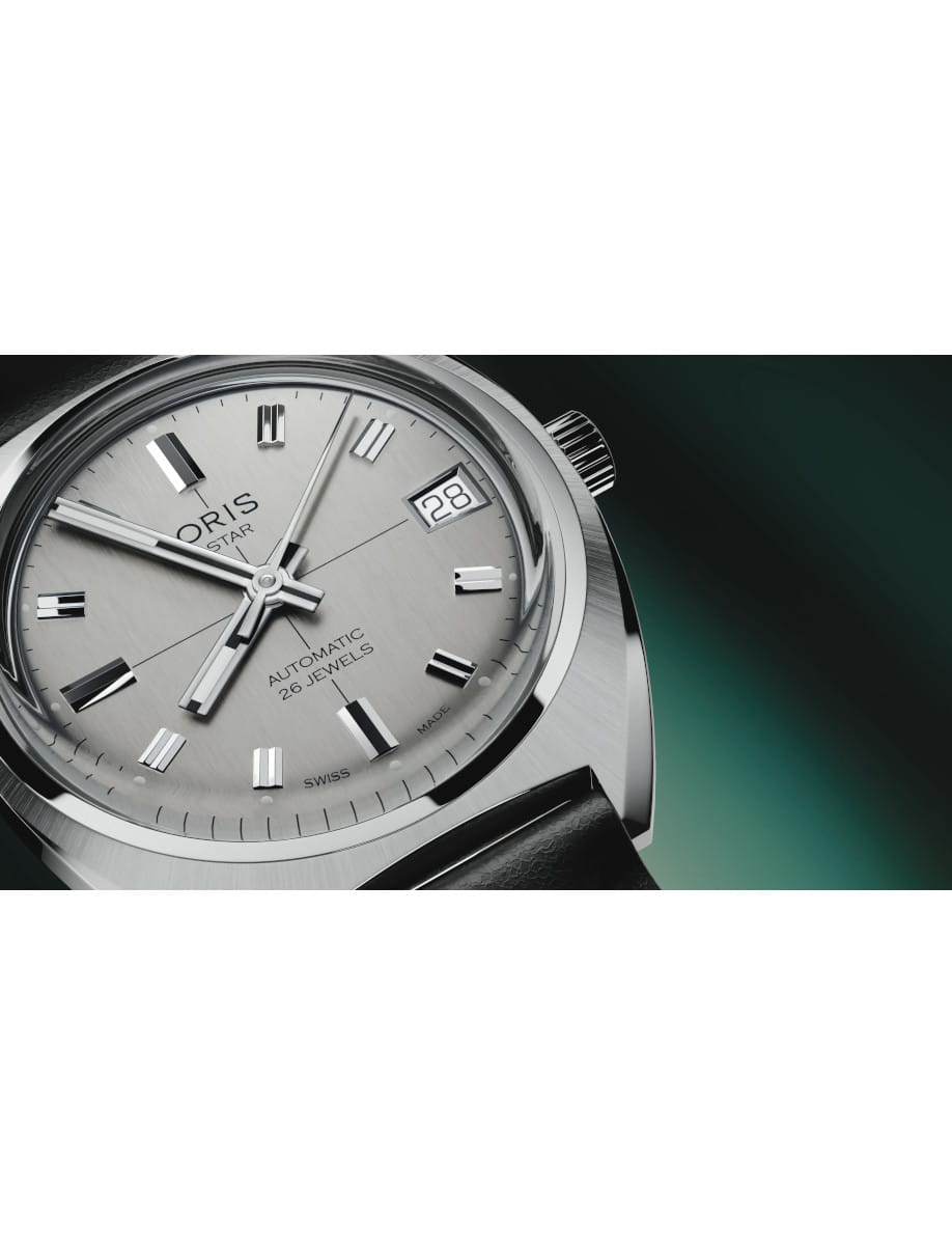 Side view of Oris wristwatch with stainless steel case, silver dial, and black leather strap.