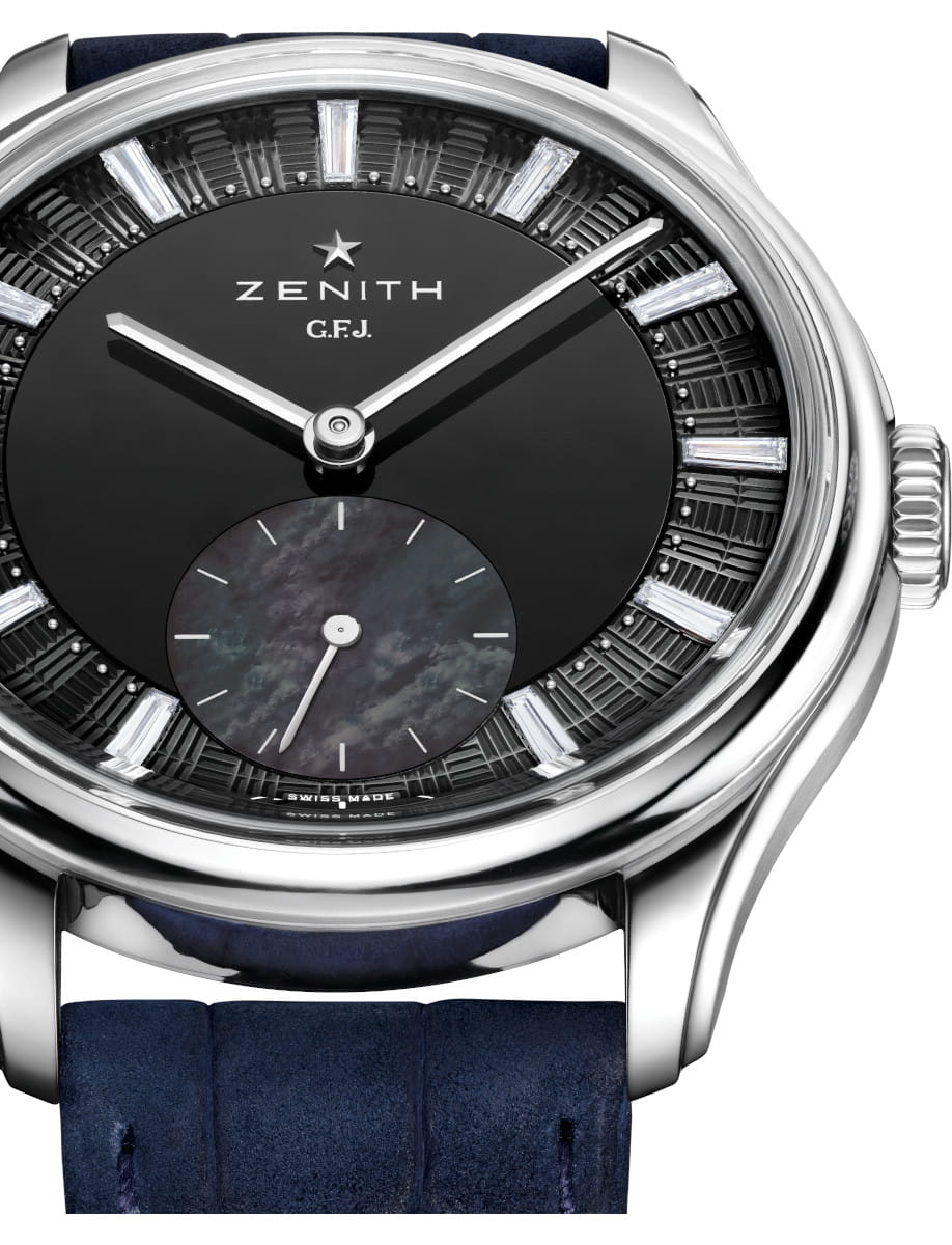 Close view of Zenith G.F.J Tantalum wristwatch with tantalum case, black onyx dial, and blue nubuck leather strap.
