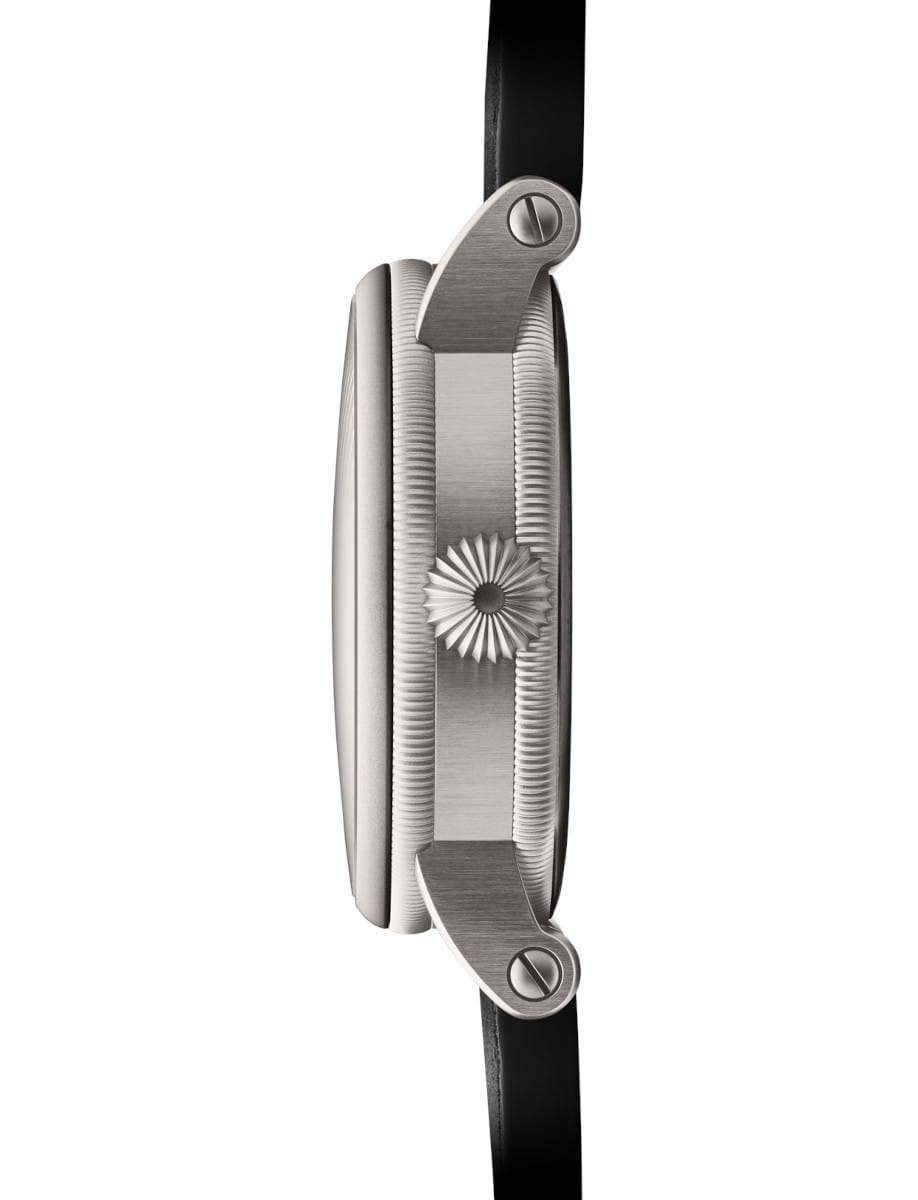 Side view of Chronoswiss Delphis Art Deco wristwatch with grade 5 titanium case, gold and blue dial, and black nubuck leather.