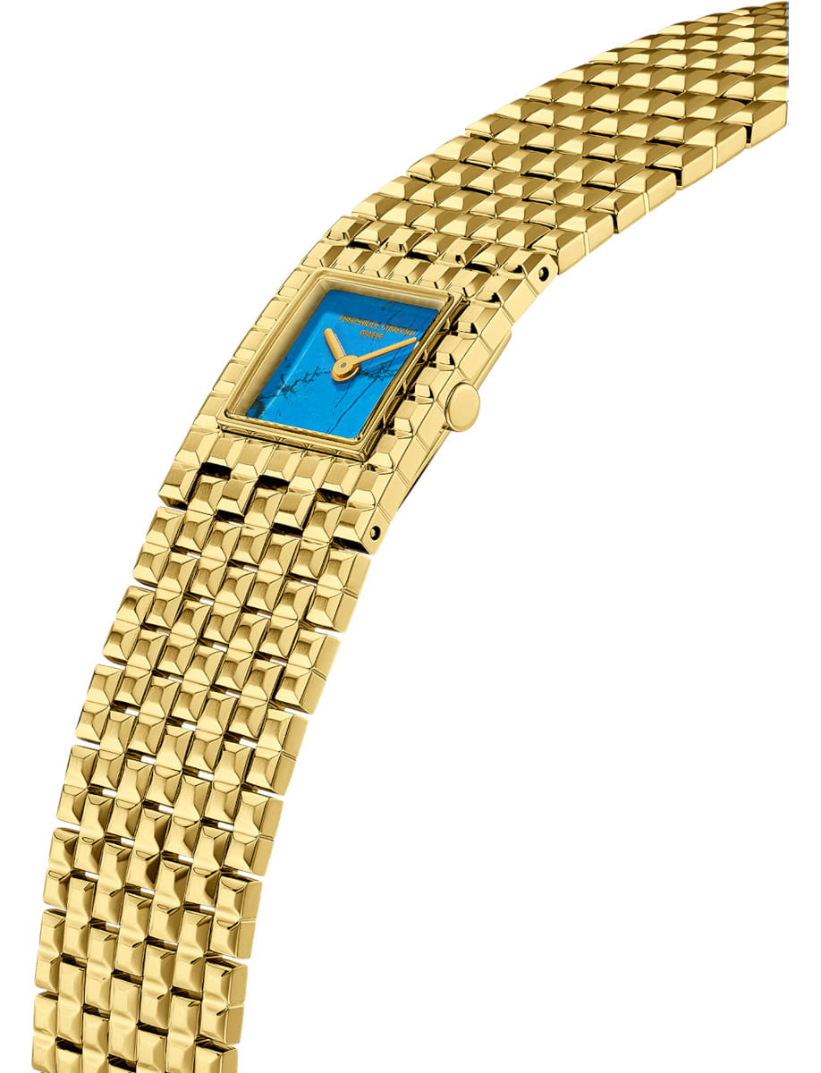 Side view of Frederique Constant Manchette wristwatch with yellow gold PVD plated stainless steel case and bracelet, and stone blue dial.