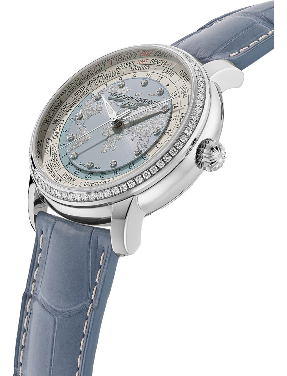 Side view of Frederique Constant Manufacture Classic Worldtimer wristwatch with stainless steel case, blue dial, and blue alligator leather strap.