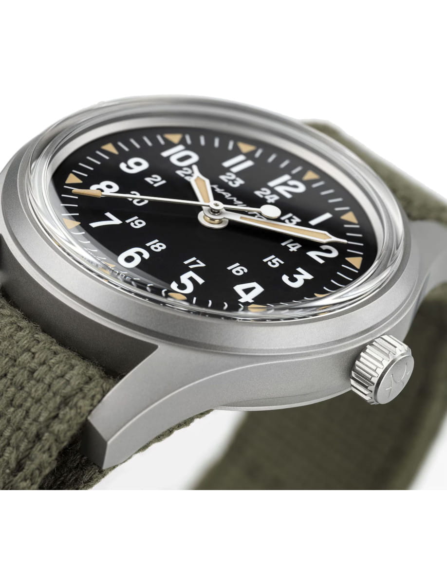 Side view of Mechanical 36 mm wristwatch with stainless steel case, black dial, and NATO strap.