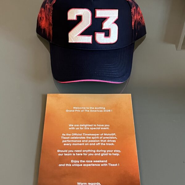 23 baseball cap with a welcome pamphlet
