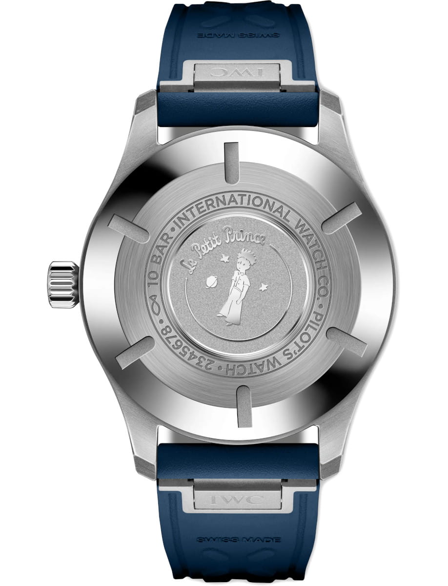 Back view of IWC Pilot's Watch Mark XX Le Petit Prince wristwatch with stainless steel case, blue dial, and blue rubber strap.