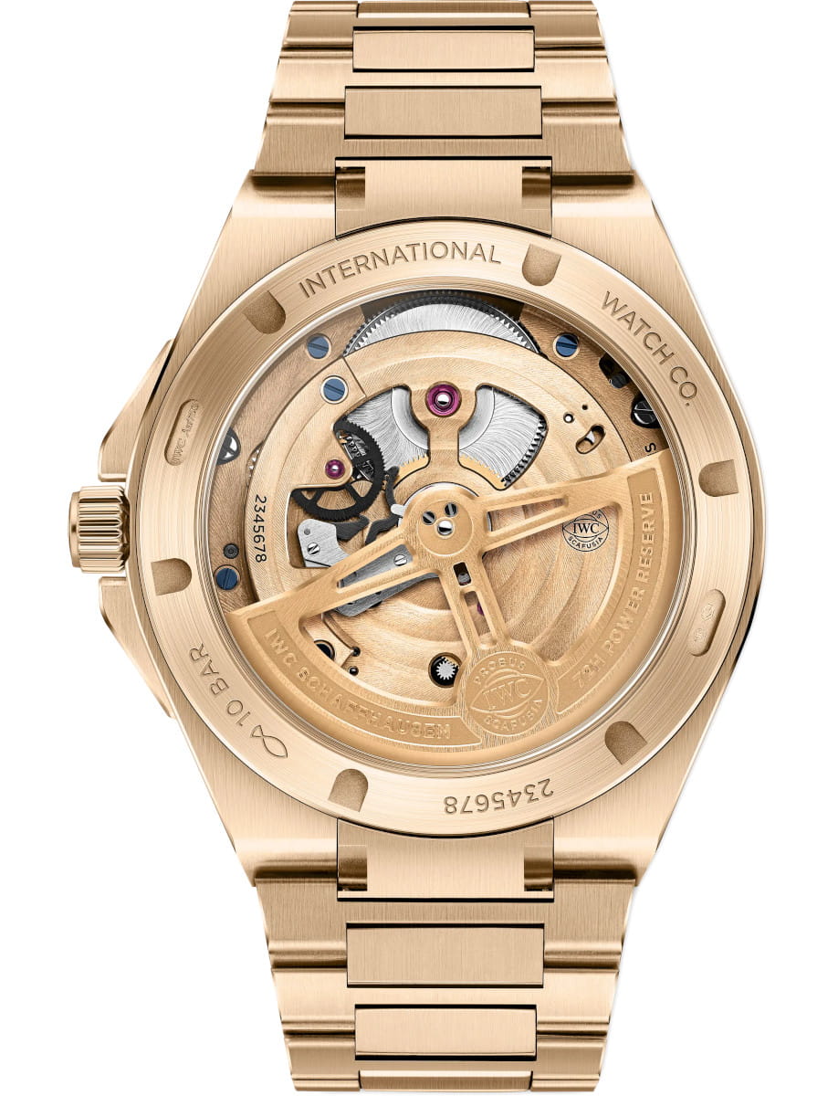 Back view of IWC Ingenieur Tourbillon 41 wristwatch with 18k 5N gold case and bracelet, and synthetic sapphire crystal caseback.