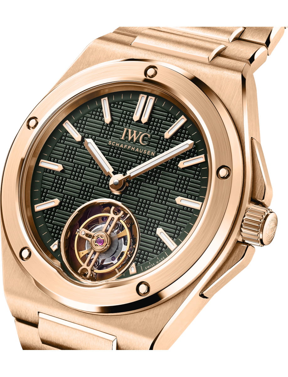 Side view of IWC Ingenieur Tourbillon 41 wristwatch with 18k 5N gold case and bracelet, and green dial.