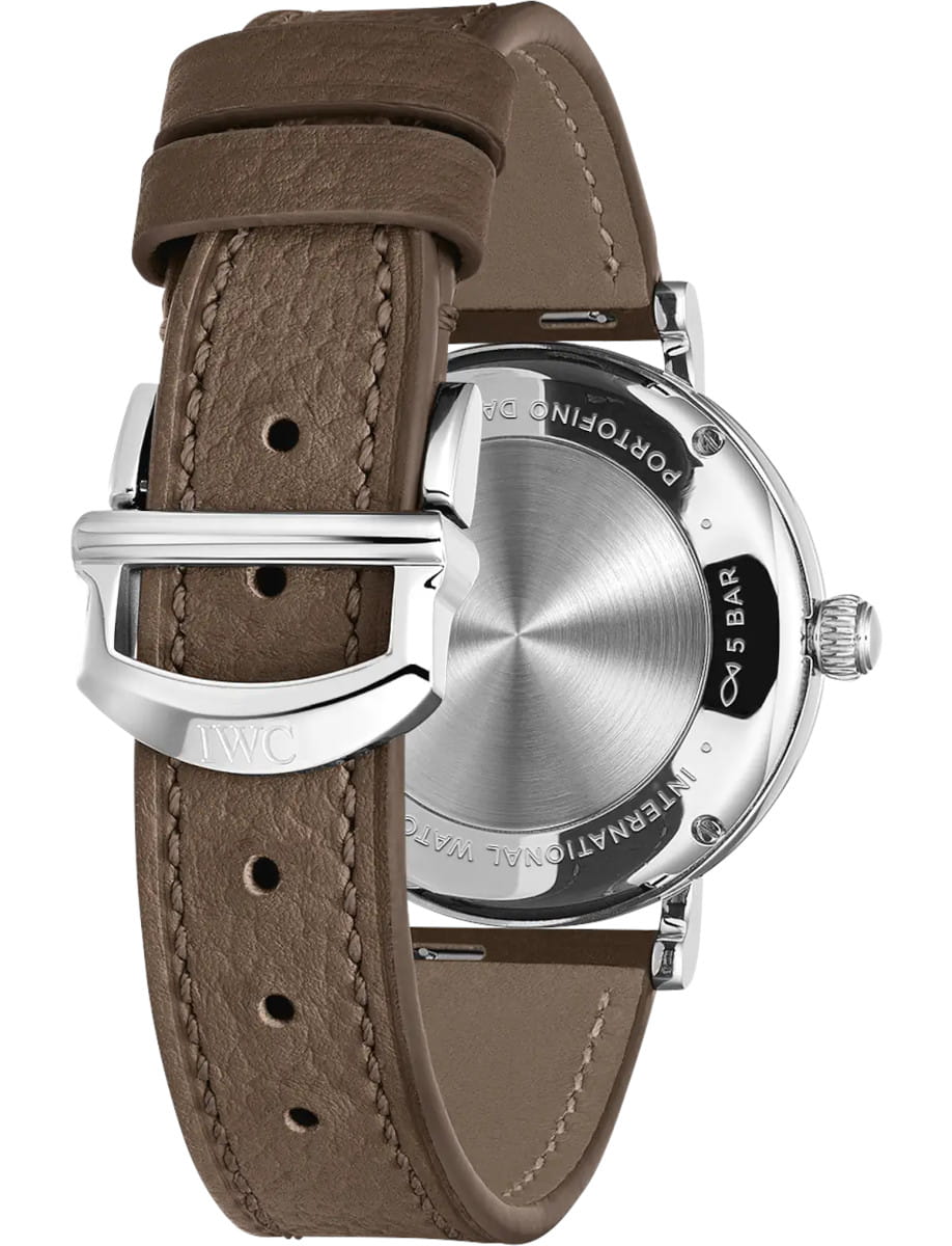 Back strap view of IWC Portofino Automatic Day & Night 34 wristwatch with stainless steel case, silver-plated dial, and taupe calfskin strap.