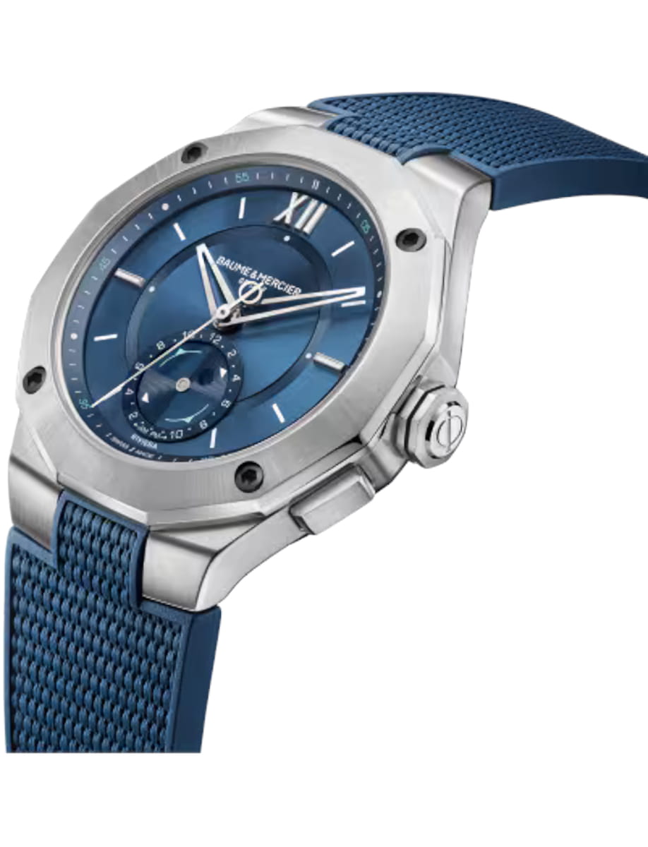 Side view of Baume & Mercier wristwatch with stainless steel case, blue dial and blue rubber strap