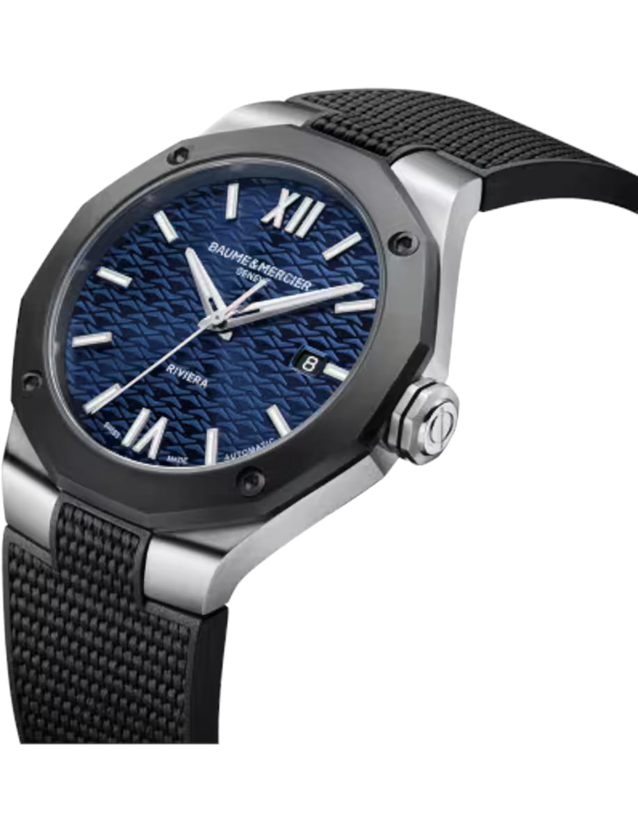 Side view of Baume & Mercier wristwatch with stainless steel case, blue dial and black rubber strap