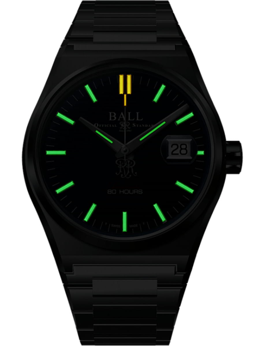 Night view of Ball Roadmaster M Perseverer wristwatch with stainless steel case and bracelet, and blue dial.