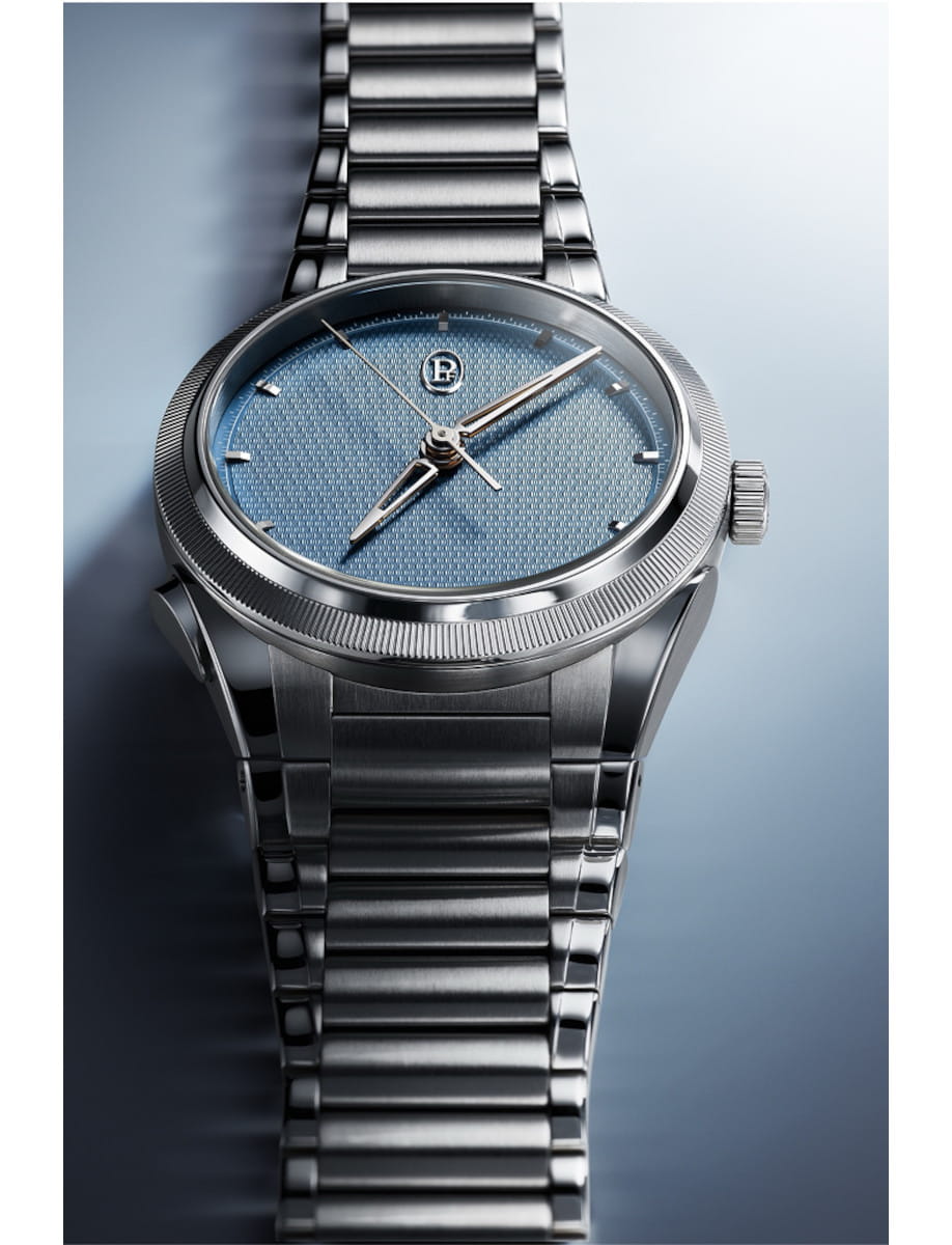 Front view of Parmigiani Fleurier Tonda PF Chronograph Mystérieux wristwatch with Stainless steel / 950 Platinum case, stainless steel bracelet, and mineral blue dial.