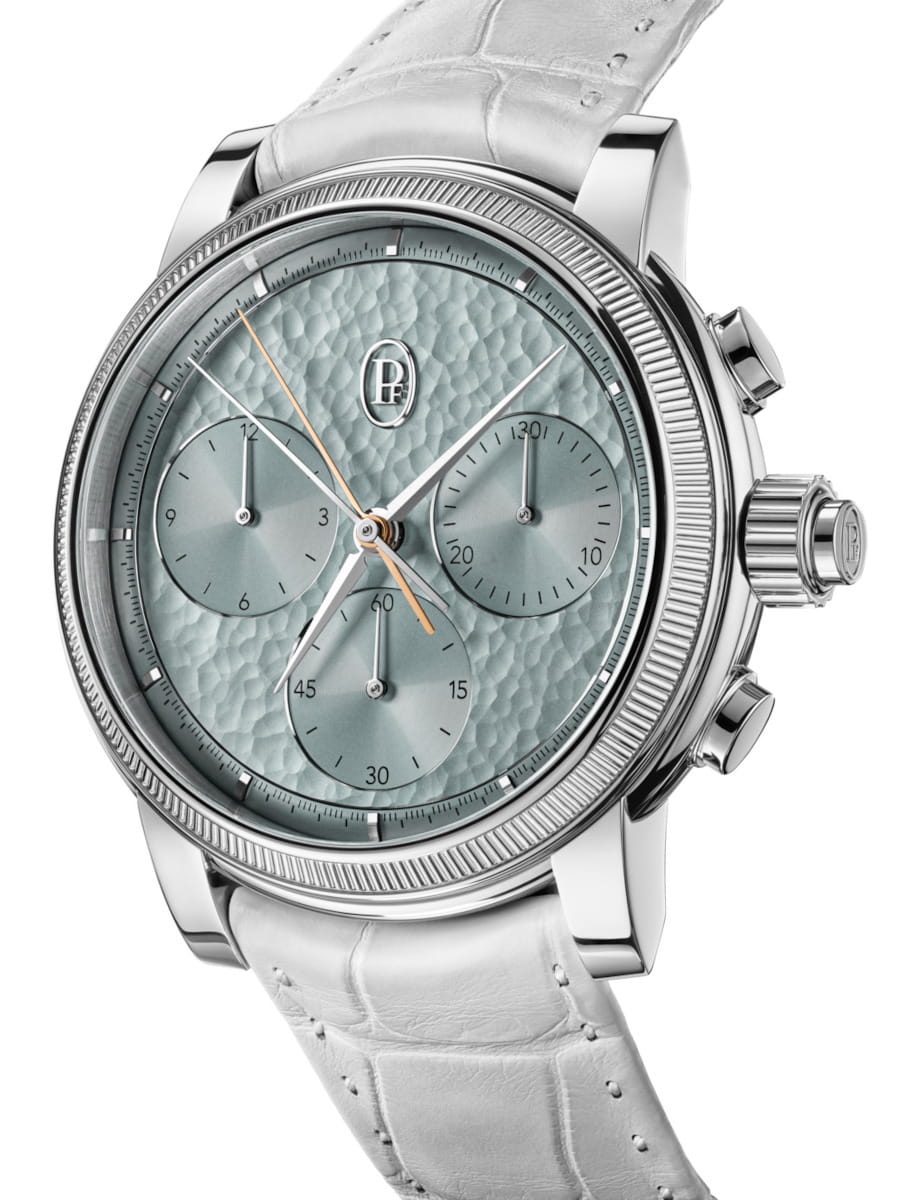 Side view of Parmigiani Fleurier Toric Chronograph Rattrapante wristwatch with 950 Platinum case, Agave Blue dial, and alligator leather strap.