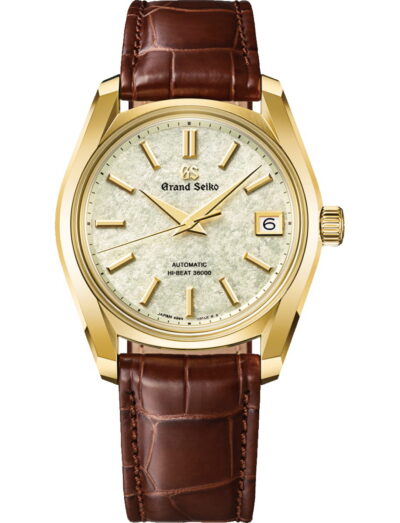 Grand Seiko wristwatch with 18k yellow gold case, light green dial and crocodile leather strap