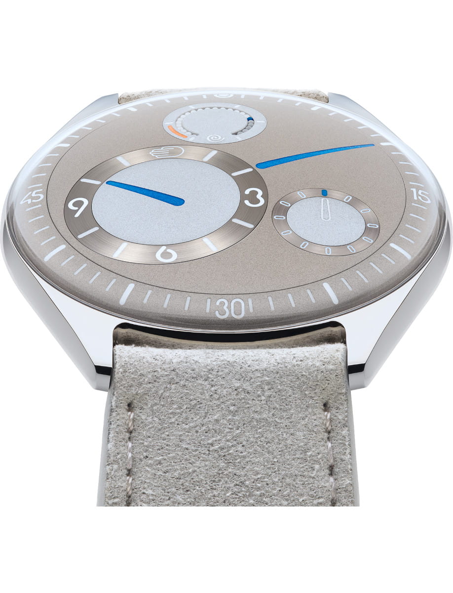 Front view of Ressence wristwatch with grade 5 titanium case, grey dial, and grey leather strap.