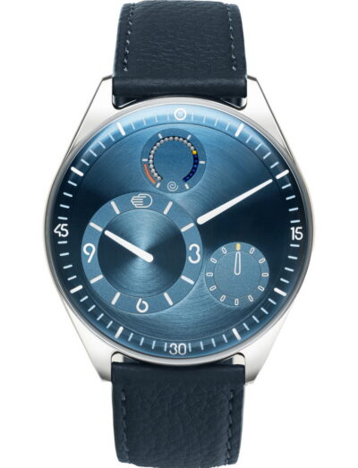 Ressence wristwatch with grade 5 titanium case, blue dial, and blue leather strap.