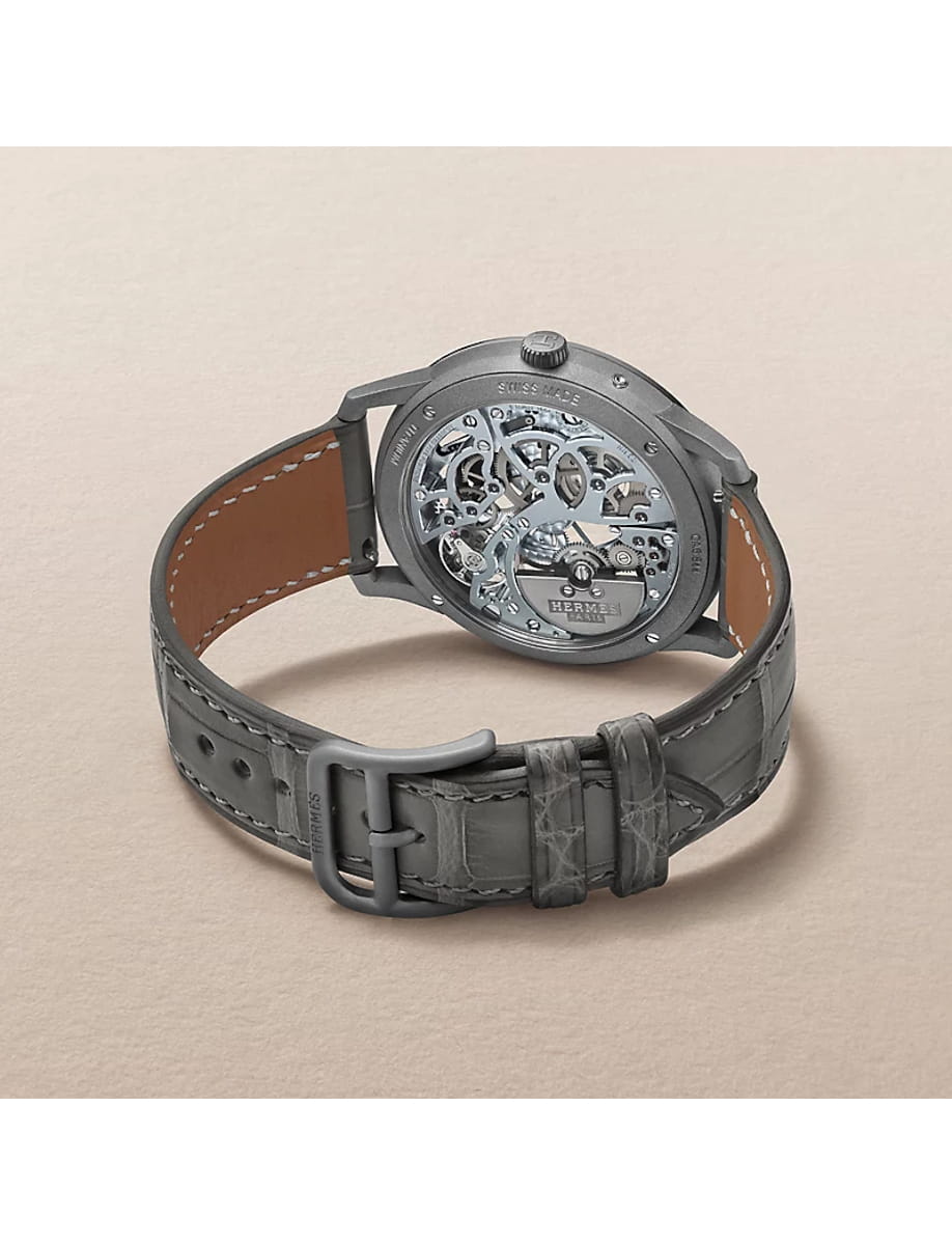 Back view of Hermes wristwatch with titanium case, skeleton dial and alligator leather strap