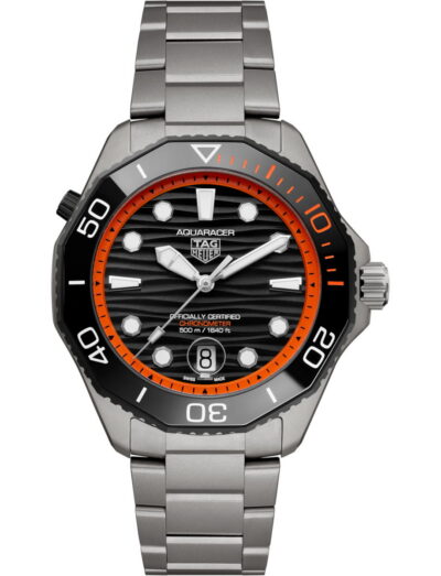 Tag Heuer Aquaracer Professional 500 Date wristwatch with titanium case and bracelet, and black and orange dial.