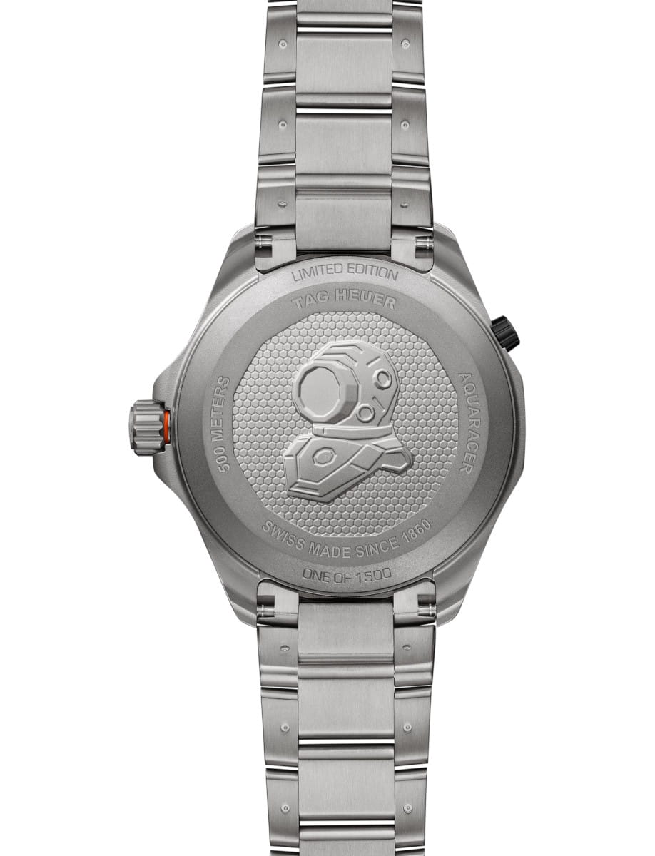 Back view of Tag Heuer Aquaracer Professional 500 Date wristwatch with titanium case and bracelet, and black and orange dial.