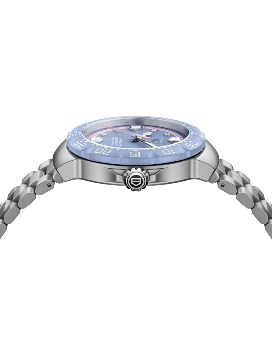 Side view of TAG Heuer wristwatch with stainless steel case and bracelet and opalin blue dial