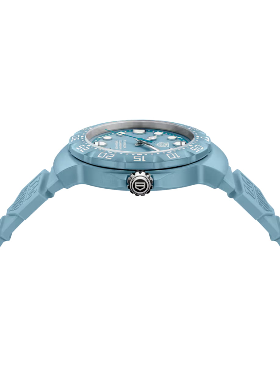 Side view of TAG Heuer Formula 1 wristwatch with TH-Polylight case, opaline blue dial and blue rubber strap