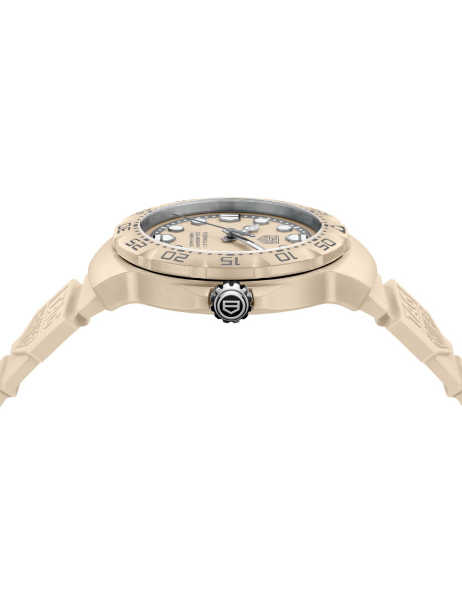 Side view of TAG Heuer Formula 1 Solargraph wristwatch with TH-Polylight case, beige opaline dial, and beige rubber strap.