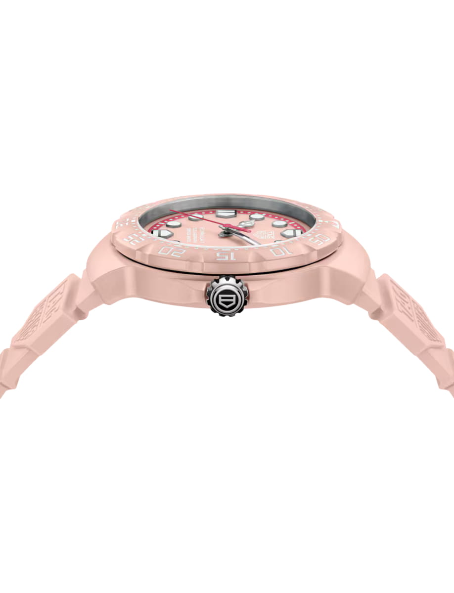 Side view of TAG Heuer Formula 1 wristwatch with TH-Polylight case, opaline pink dial and pink rubber strap