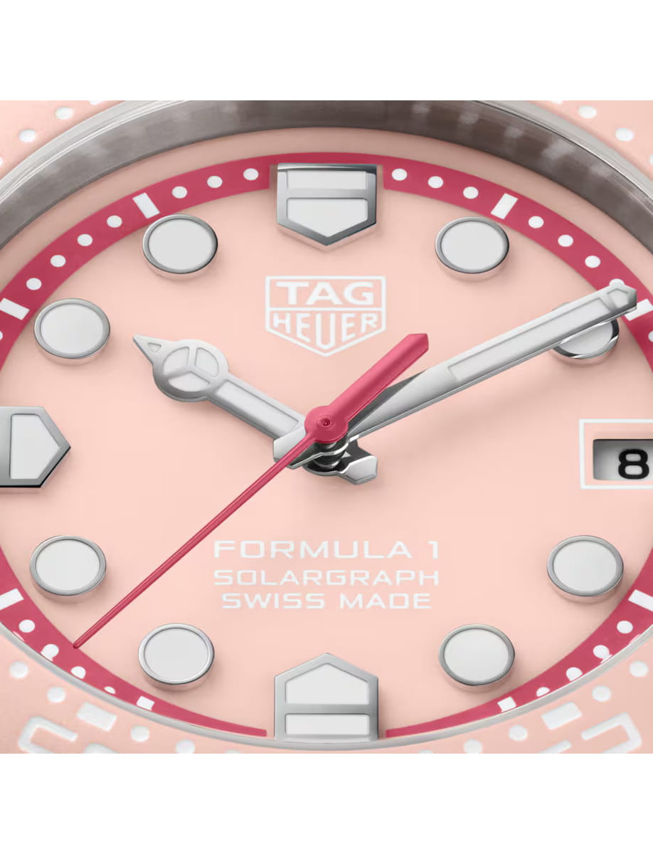 Close view of TAG Heuer Formula 1 wristwatch with TH-Polylight case, opaline pink dial and pink rubber strap