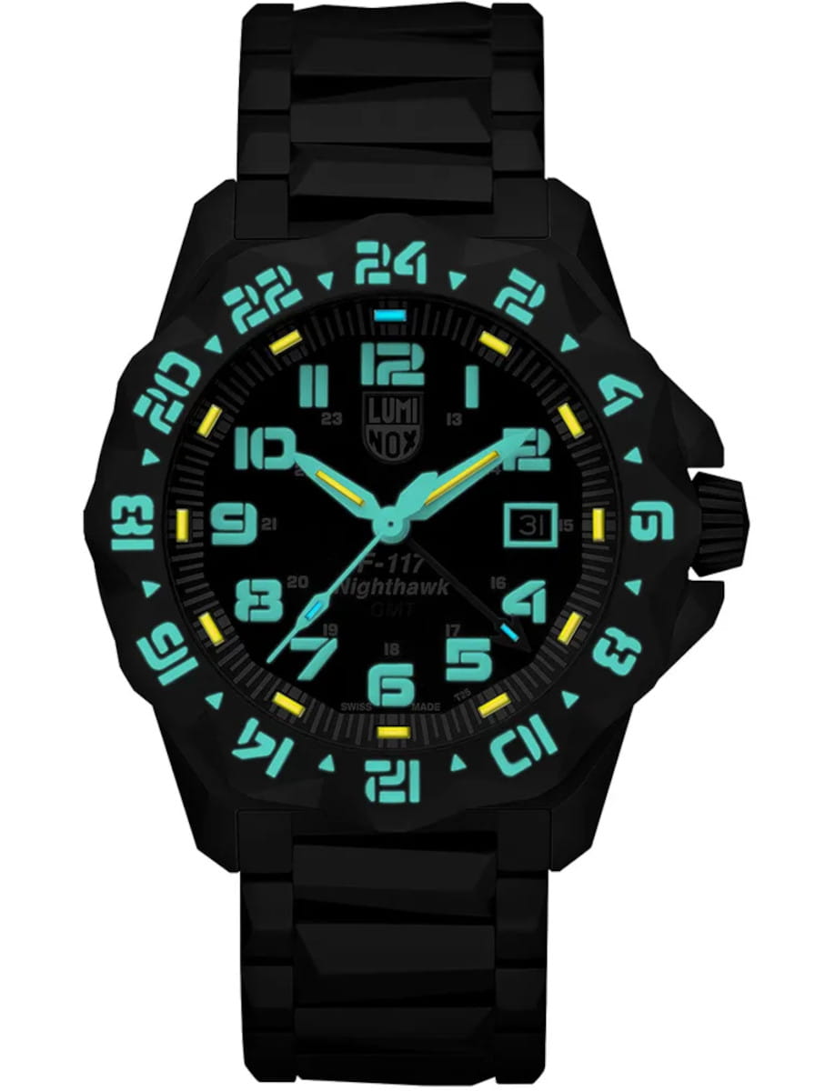 Night view of Luminox wristwatch featured in black PVD stainless steel, quartz movement with GMT function, black dial, black PVD stainless steel bracelet.